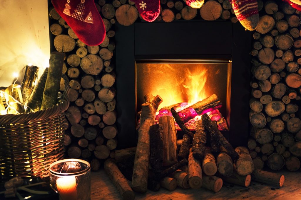 Brown Beside Fireplace Near Brown Wicker Basket