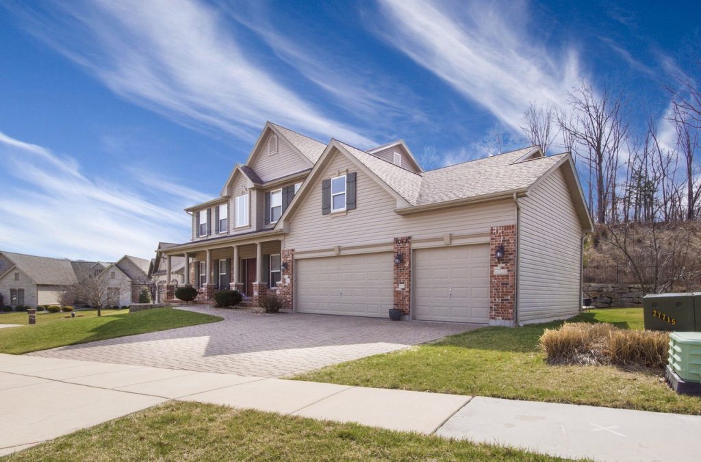 Beautiful house entrance with trimmed grass